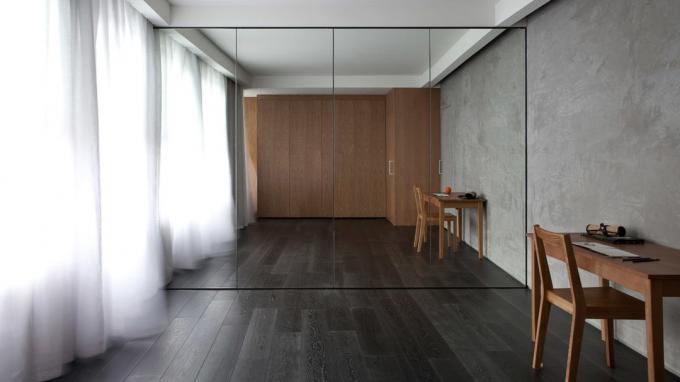Илюзията на пространството в 26 m²: къде и как да скриете всички мебели