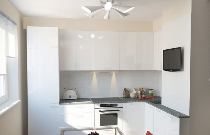 Бялото може да не е най-практичният цвят за кухнята, но играе добре, за да разшири пространството.